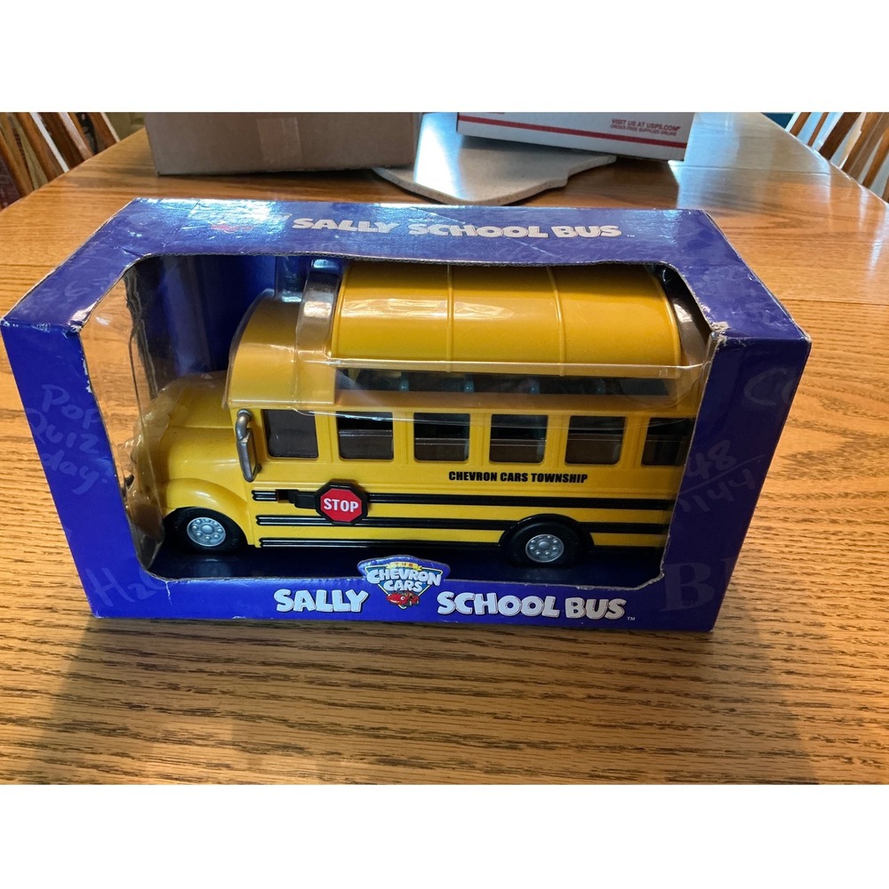 Chevron Cars Sally School Bus Yellow Collectible Toy Vehicle Moving Eyes New Box